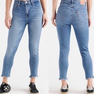 Levis woman’s 721 high rise skinny chewed raw hem blue jean